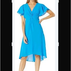 Brand new Adriana, Papell turquoise dress new with tags.